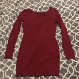 Form fitting long sleeve maroon dress